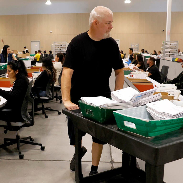 Election workers process ballots for the California state primary election at the Los Angeles County Ballot Processing Center on June 05, 2026 in City of Industry, California.